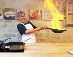 Flambeeing gambas in Provence